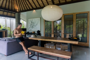 Overwater suite living space at Lila Resort